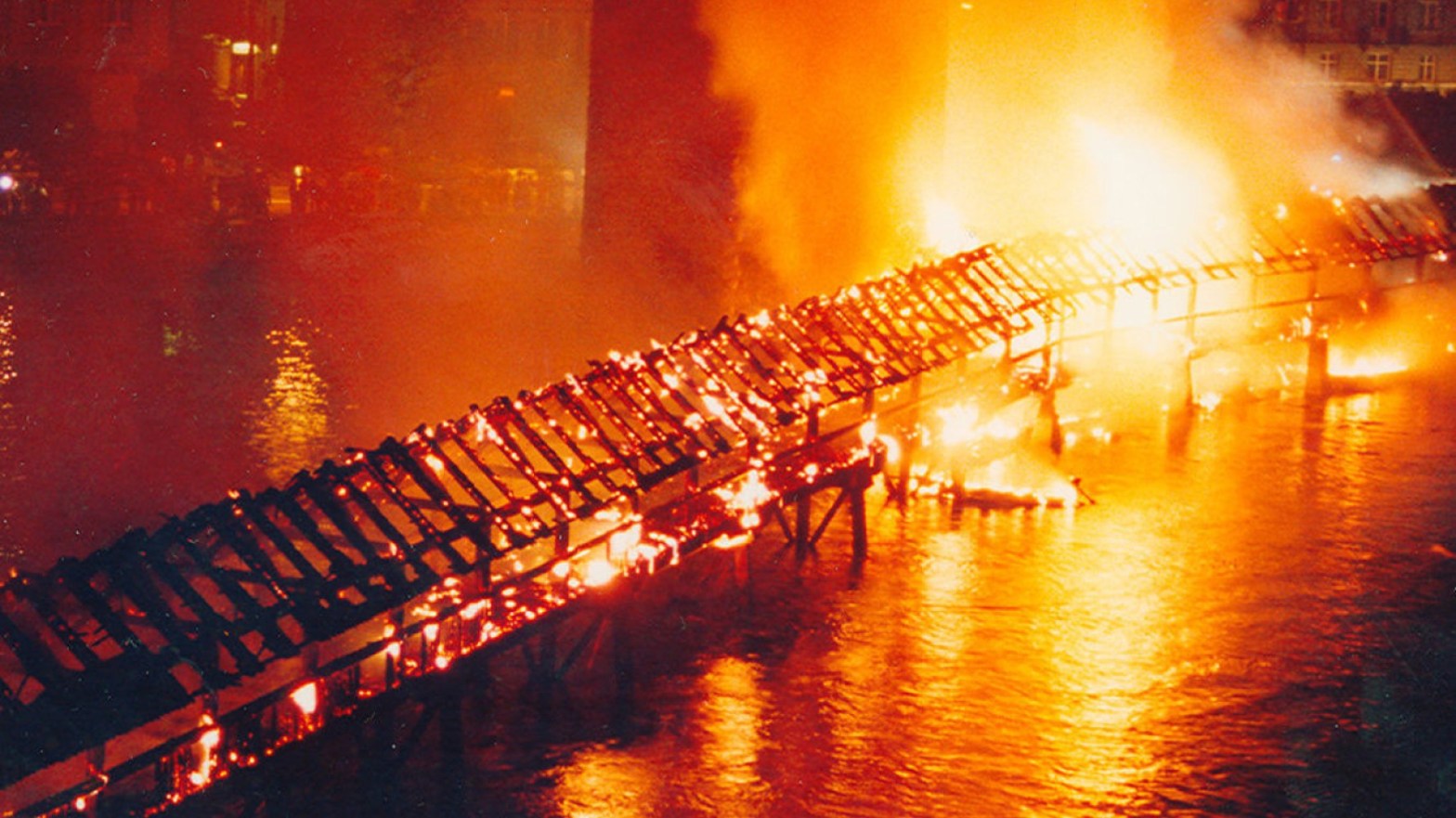 Chapel Bridge in Lucerne, on fire, 18 August 1993